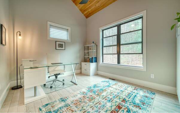 740 Chestnut Mountain Road Blairsville, GA 30512 - Photo 60 of 75 a bed room with a bed and a window