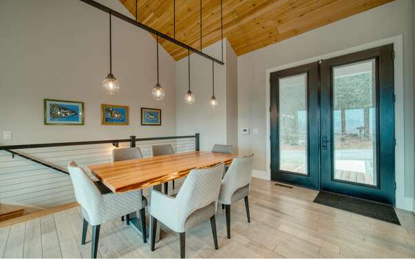 740 Chestnut Mountain Road Blairsville, GA 30512 - Photo 8 of 75 a dining room with a table and chairs