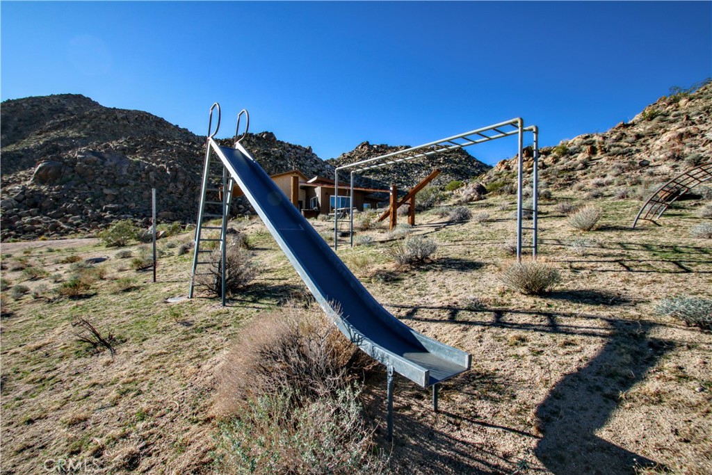 4650 Sizer Canyon Road Johnson Valley, CA 92285 - Photo 34 of 36 a view of a roof deck with a mountain