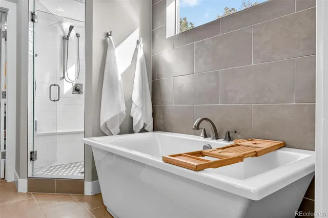 a bathroom with a sink and shower