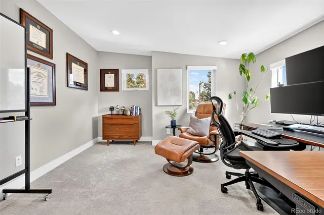 a room with furniture and a flat screen tv
