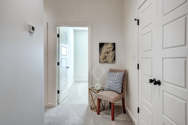 a bathroom with a sink toilet vanity and tub