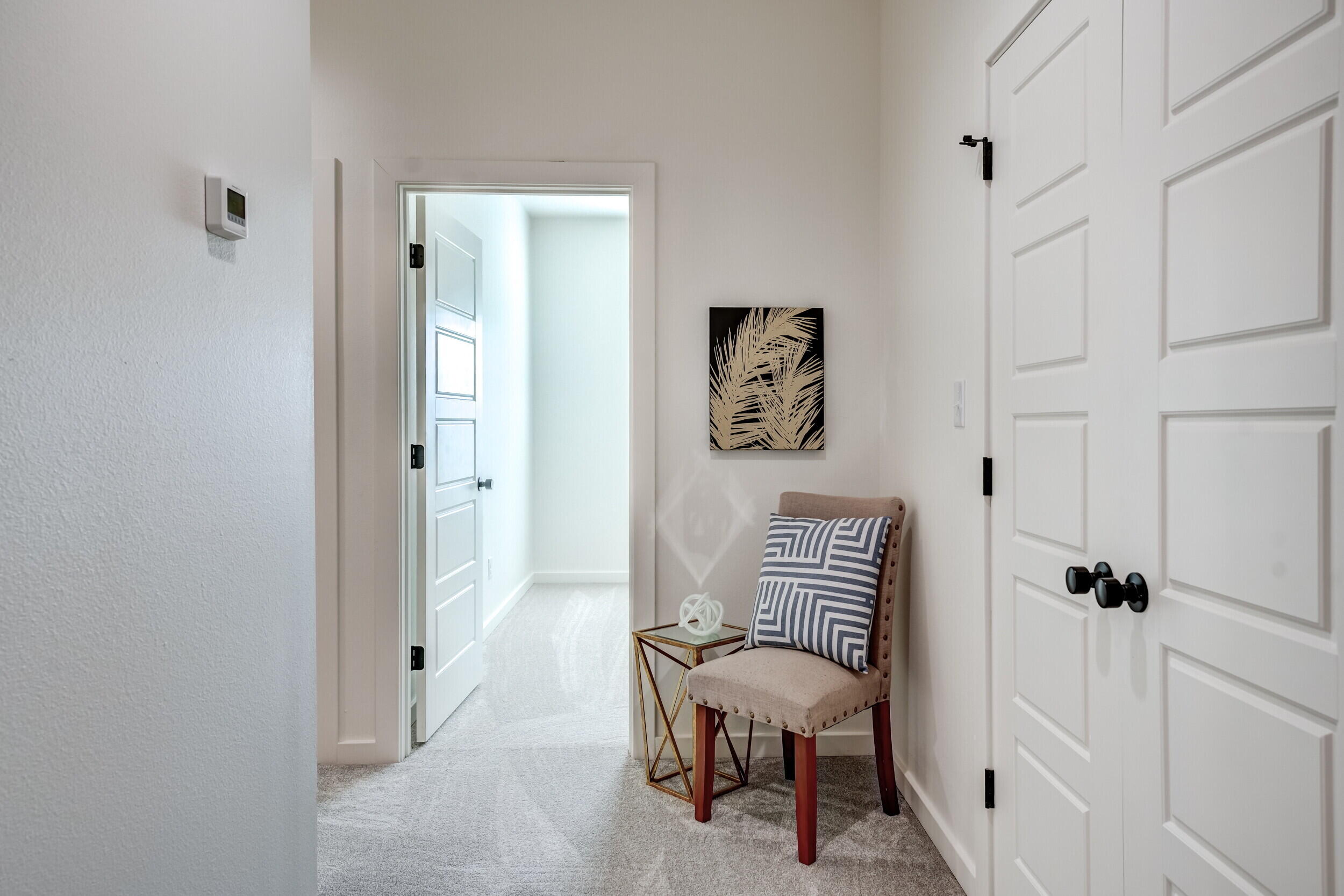 310 Homestead Avenue, Unit 16 Lubbock, TX 79416 - Photo 18 of 29 a view of room with furniture and wooden floor