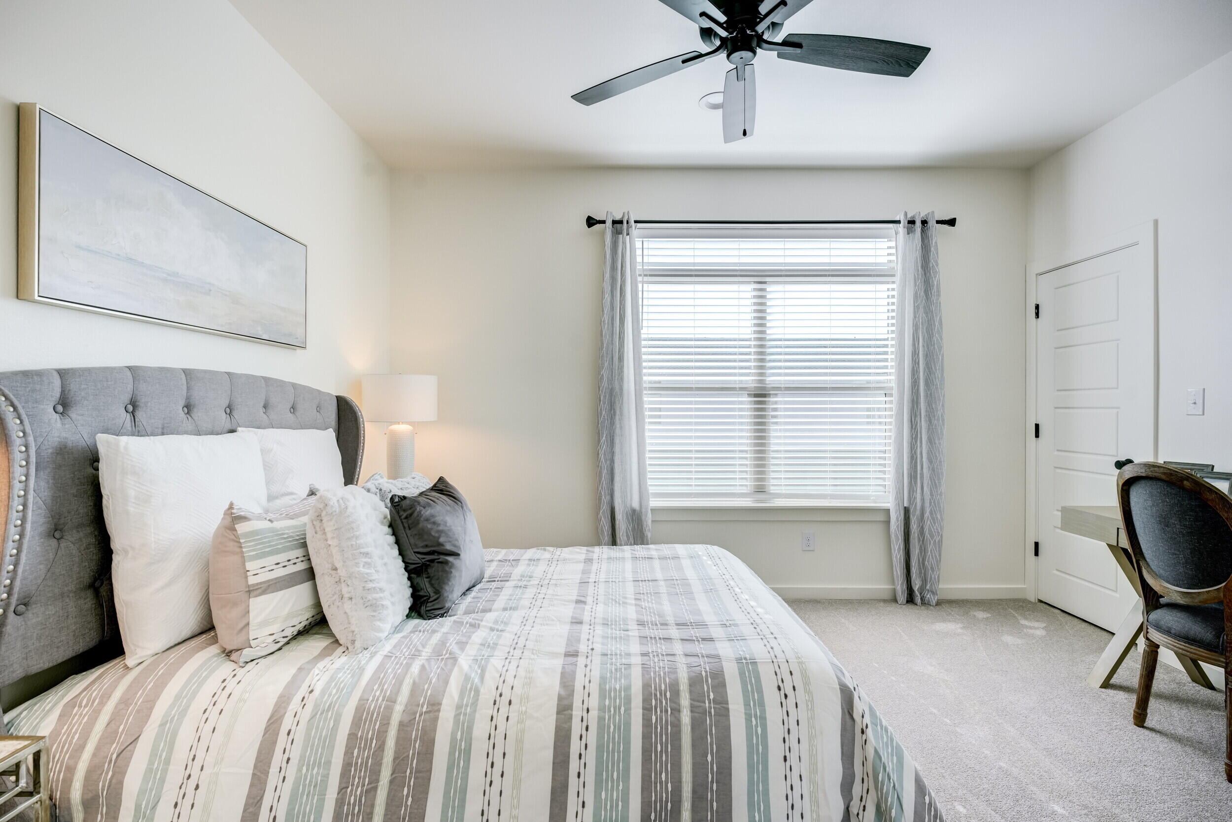 310 Homestead Avenue, Unit 16 Lubbock, TX 79416 - Photo 24 of 29 a bedroom with a bed and a window
