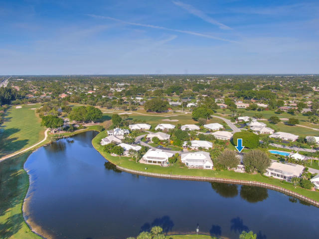 434 French Royale Circle Atlantis, FL 33462 - Photo 2 of 17 a view of a lake from a balcony