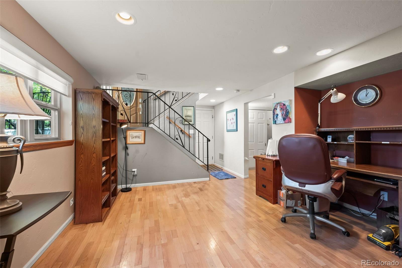 1560 Findlay Way Boulder, CO 80305 - Photo 21 of 40 a room with wooden floor and furniture