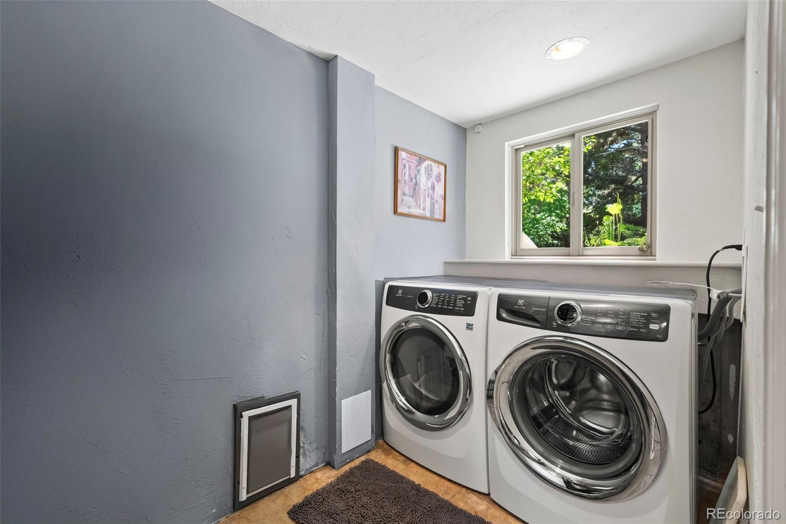 1560 Findlay Way Boulder, CO 80305 - Photo 23 of 40 a utility room with dryer and washer