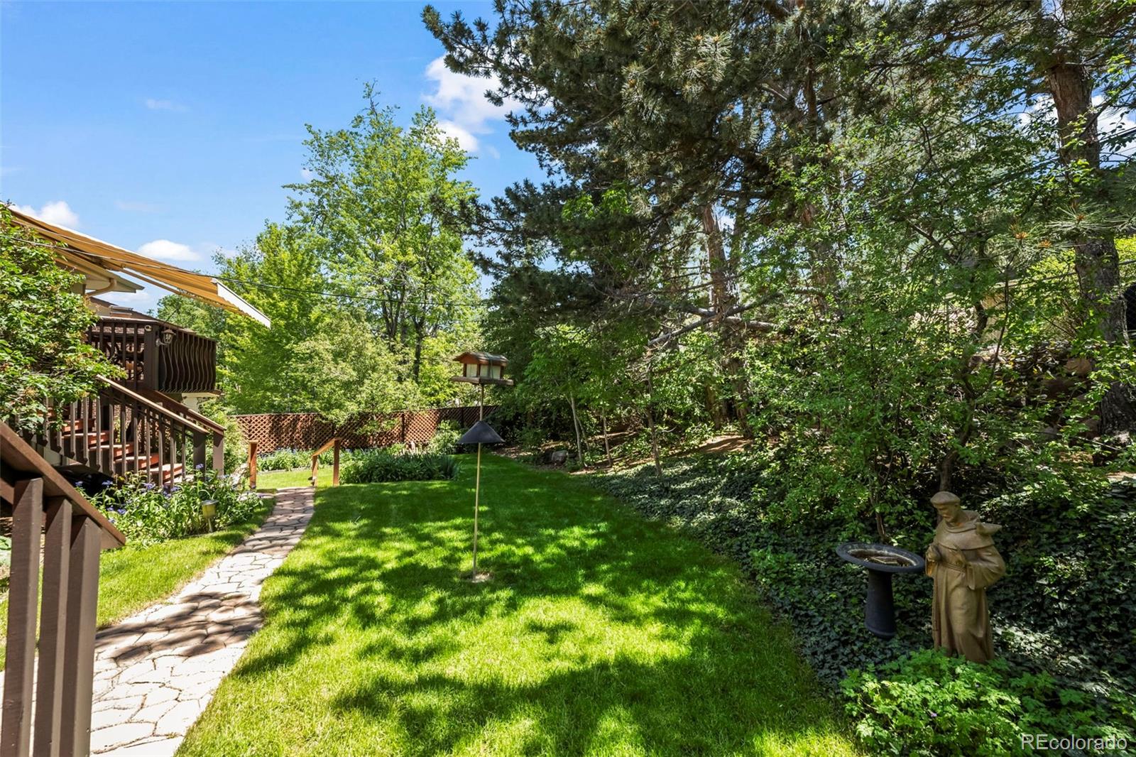 1560 Findlay Way Boulder, CO 80305 - Photo 30 of 40 a view of street with lush green forest