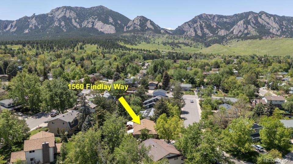 1560 Findlay Way Boulder, CO 80305 - Photo 39 of 40 a view of a house with a mountain and a forest