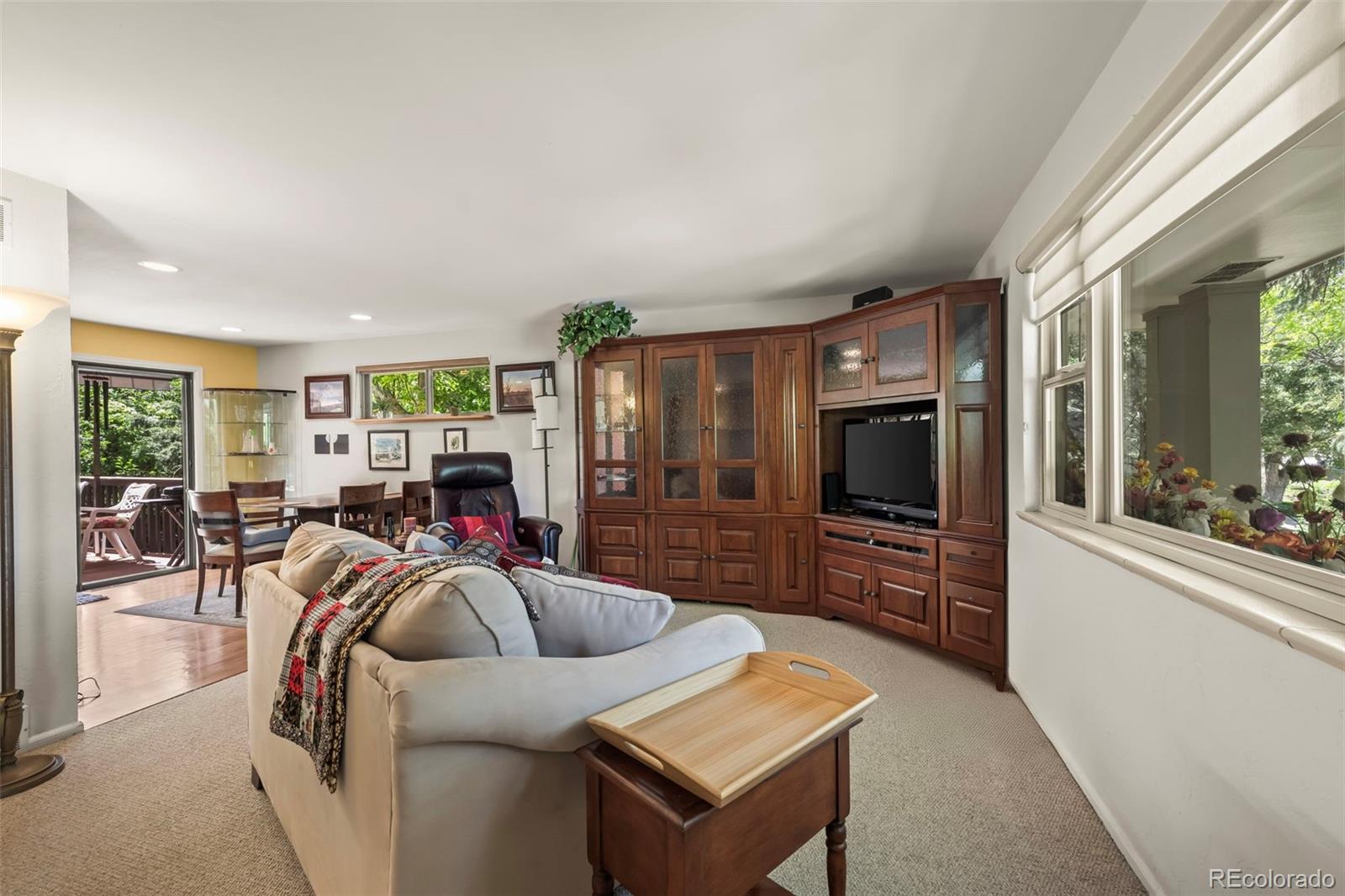 1560 Findlay Way Boulder, CO 80305 - Photo 6 of 40 a living room with furniture and a flat screen tv
