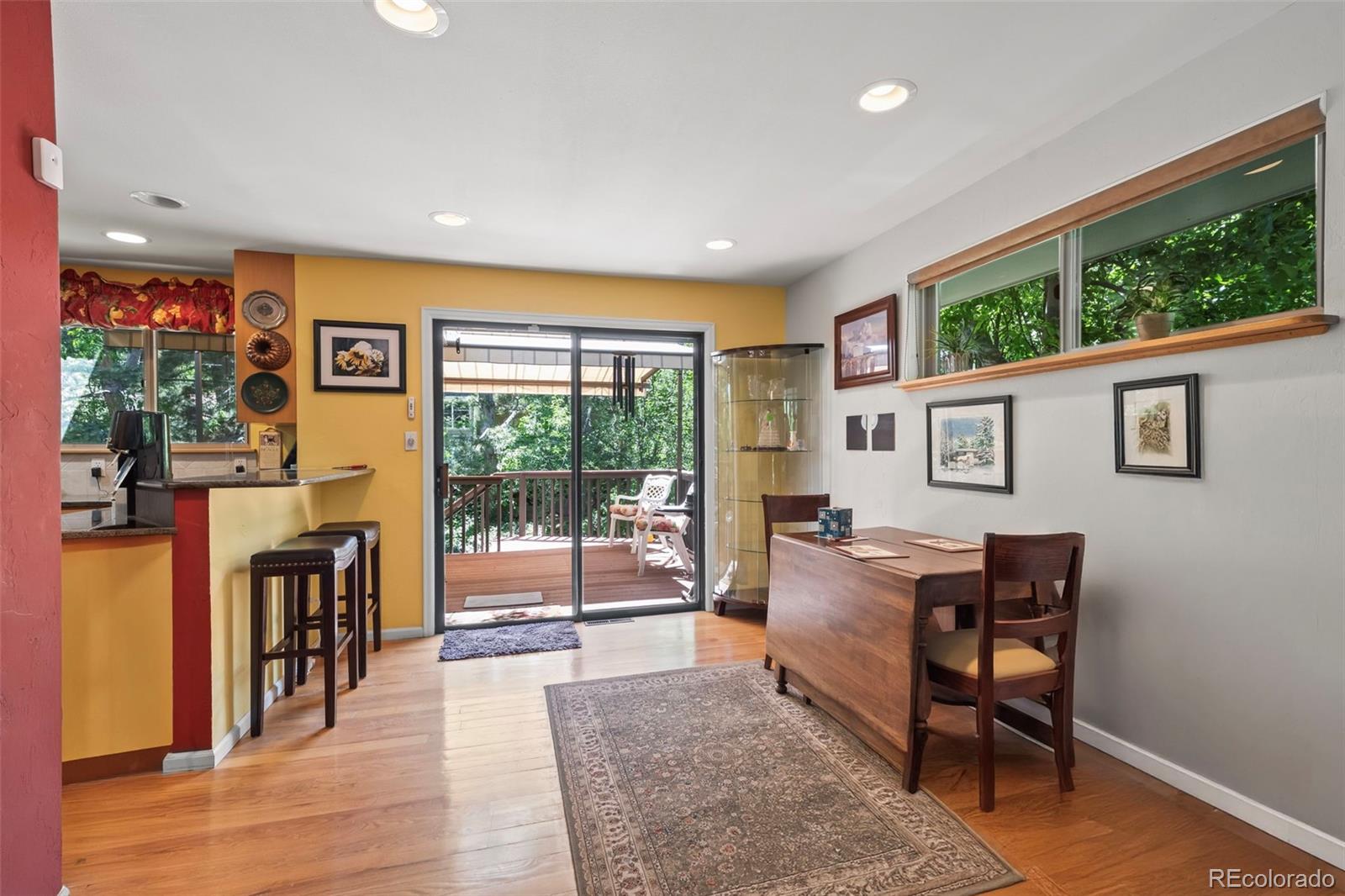 1560 Findlay Way Boulder, CO 80305 - Photo 7 of 40 a living room with furniture and a floor to ceiling window