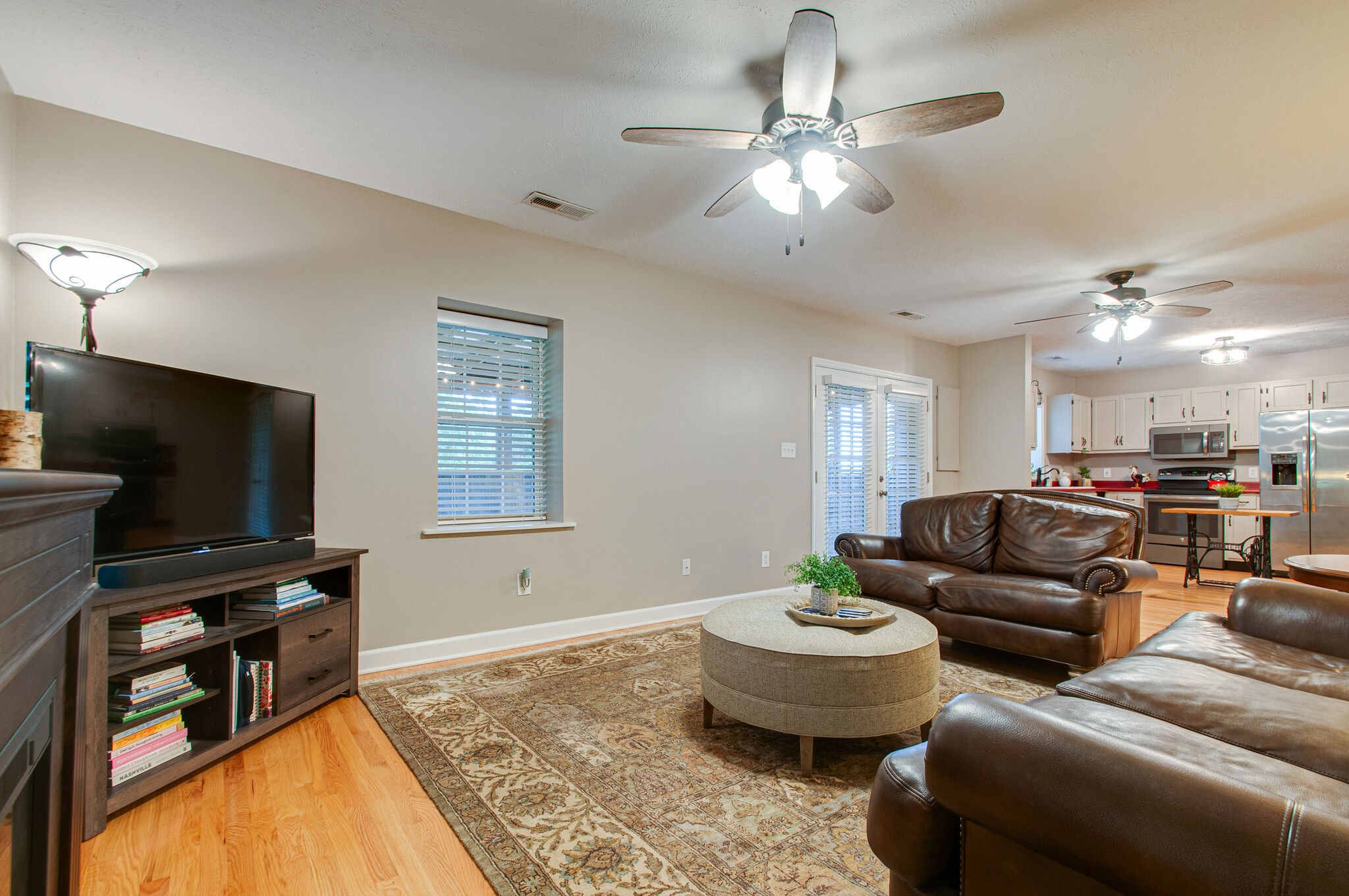 7264 Deer Ridge Road Fairview, TN 37062 - Photo 12 of 37 a living room with furniture and a flat screen tv