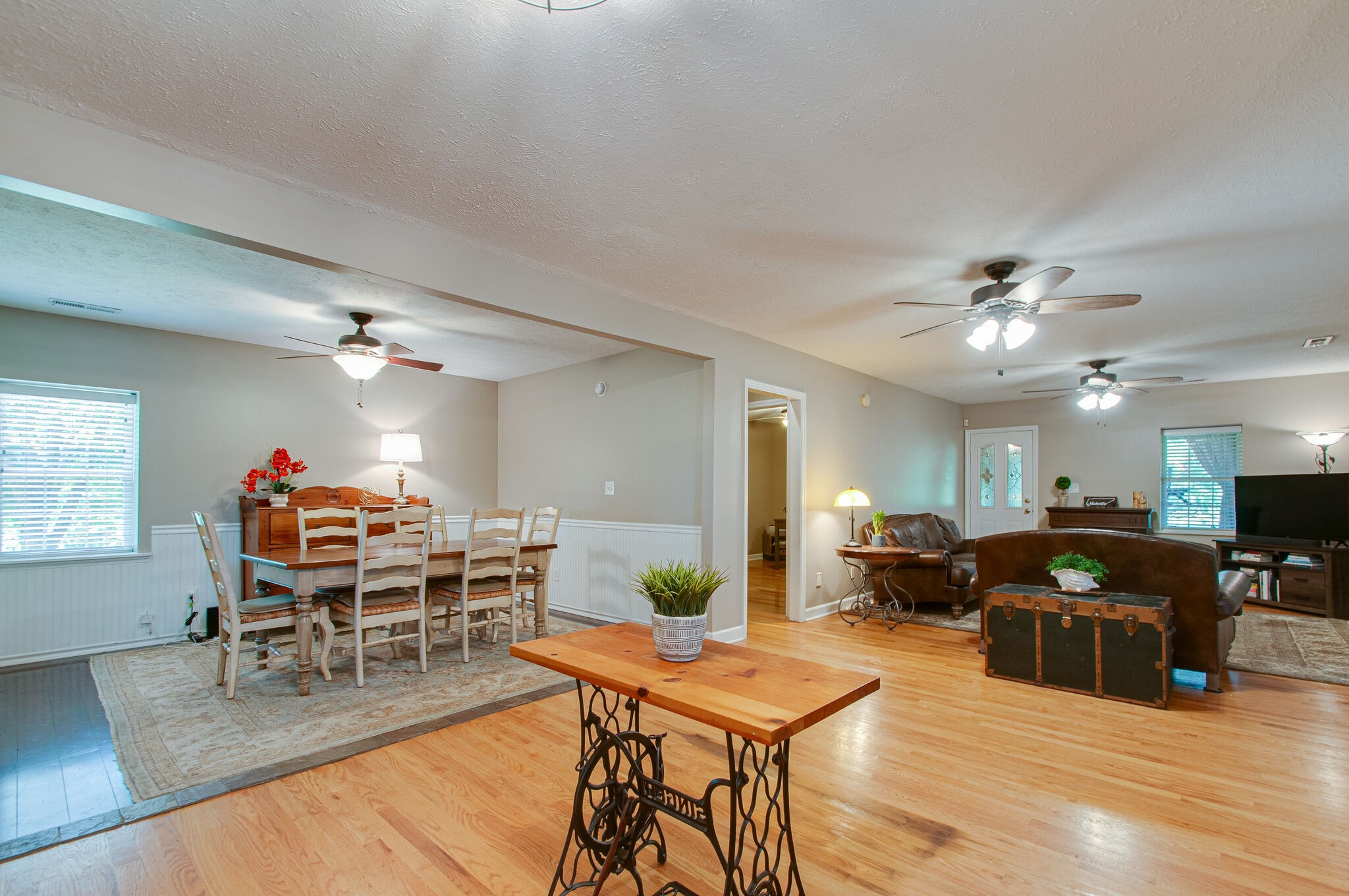 7264 Deer Ridge Road Fairview, TN 37062 - Photo 13 of 37 a living room with furniture a dining table and kitchen view