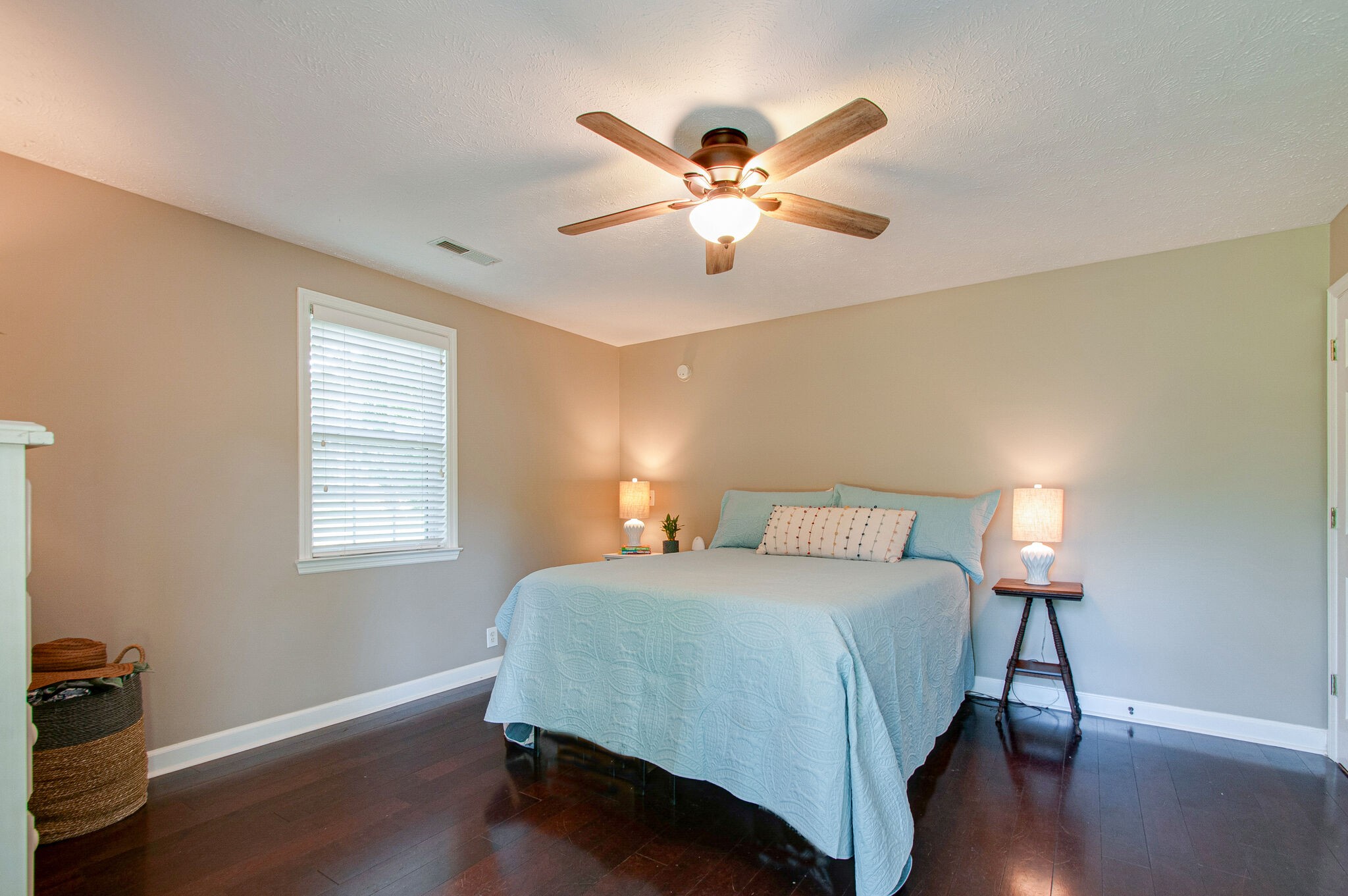 7264 Deer Ridge Road Fairview, TN 37062 - Photo 19 of 37 a bedroom with a bed and wooden floor