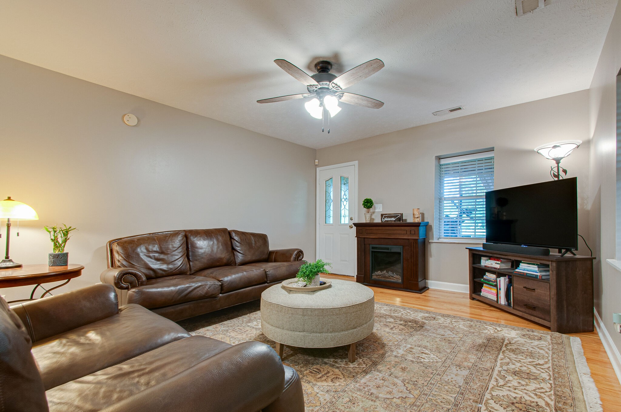 7264 Deer Ridge Road Fairview, TN 37062 - Photo 9 of 37 a living room with furniture and a flat screen tv