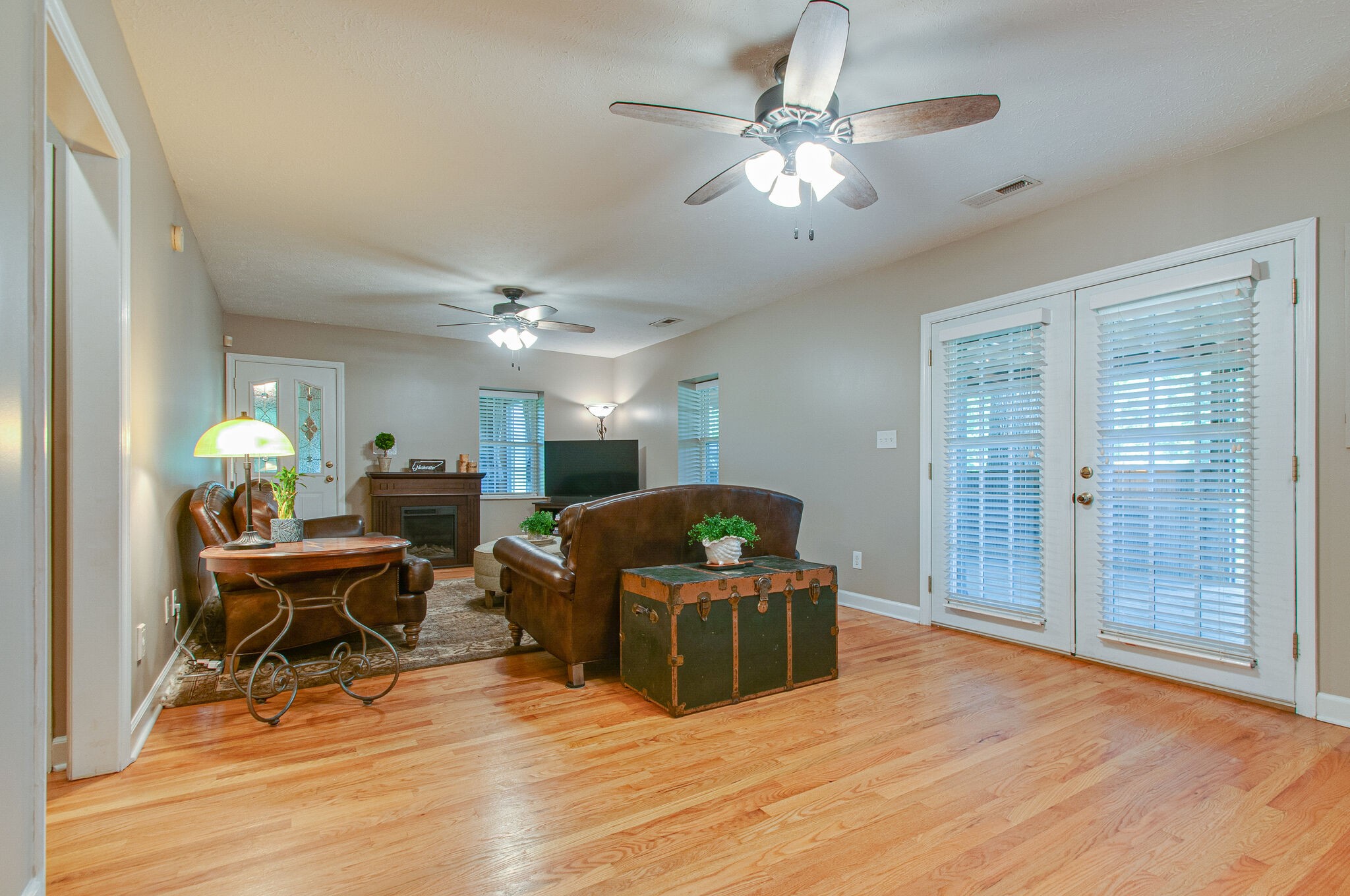 7264 Deer Ridge Road Fairview, TN 37062 - Photo 10 of 37 a living room with furniture and a chandelier
