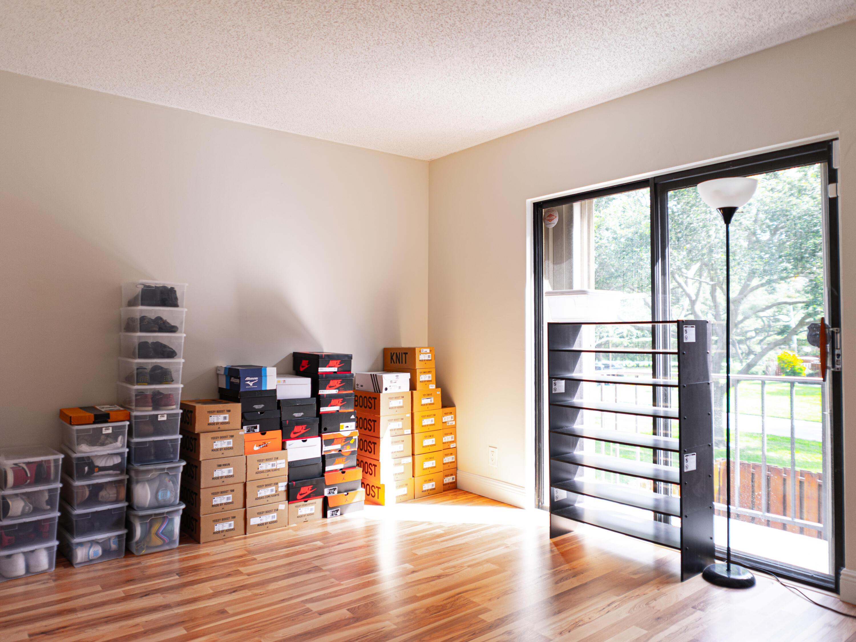 3118 Spanish Wells Drive, Unit 15B Delray Beach, FL 33445 - Photo 19 of 23 a view of a livingroom with furniture and wooden floor