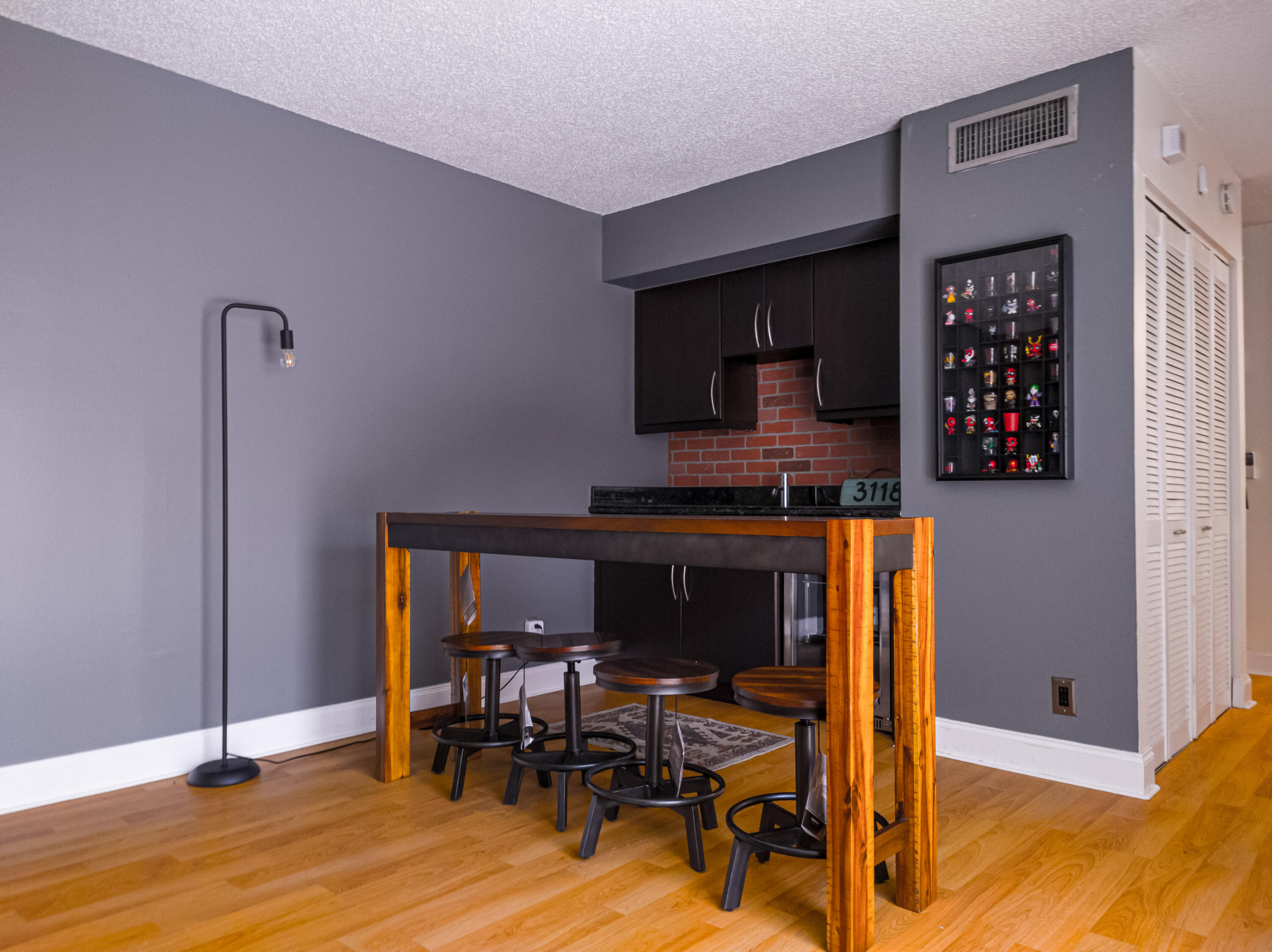 3118 Spanish Wells Drive, Unit 15B Delray Beach, FL 33445 - Photo 8 of 23 a view of a workspace with furniture