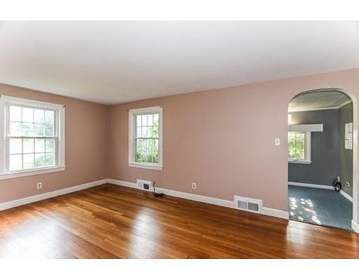 480 Plumtree Road Springfield, MA 01118 - Photo 12 of 28 an empty room with wooden floor and windows