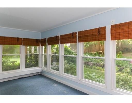 480 Plumtree Road Springfield, MA 01118 - Photo 22 of 28 a view of an empty room with wooden floor and windows