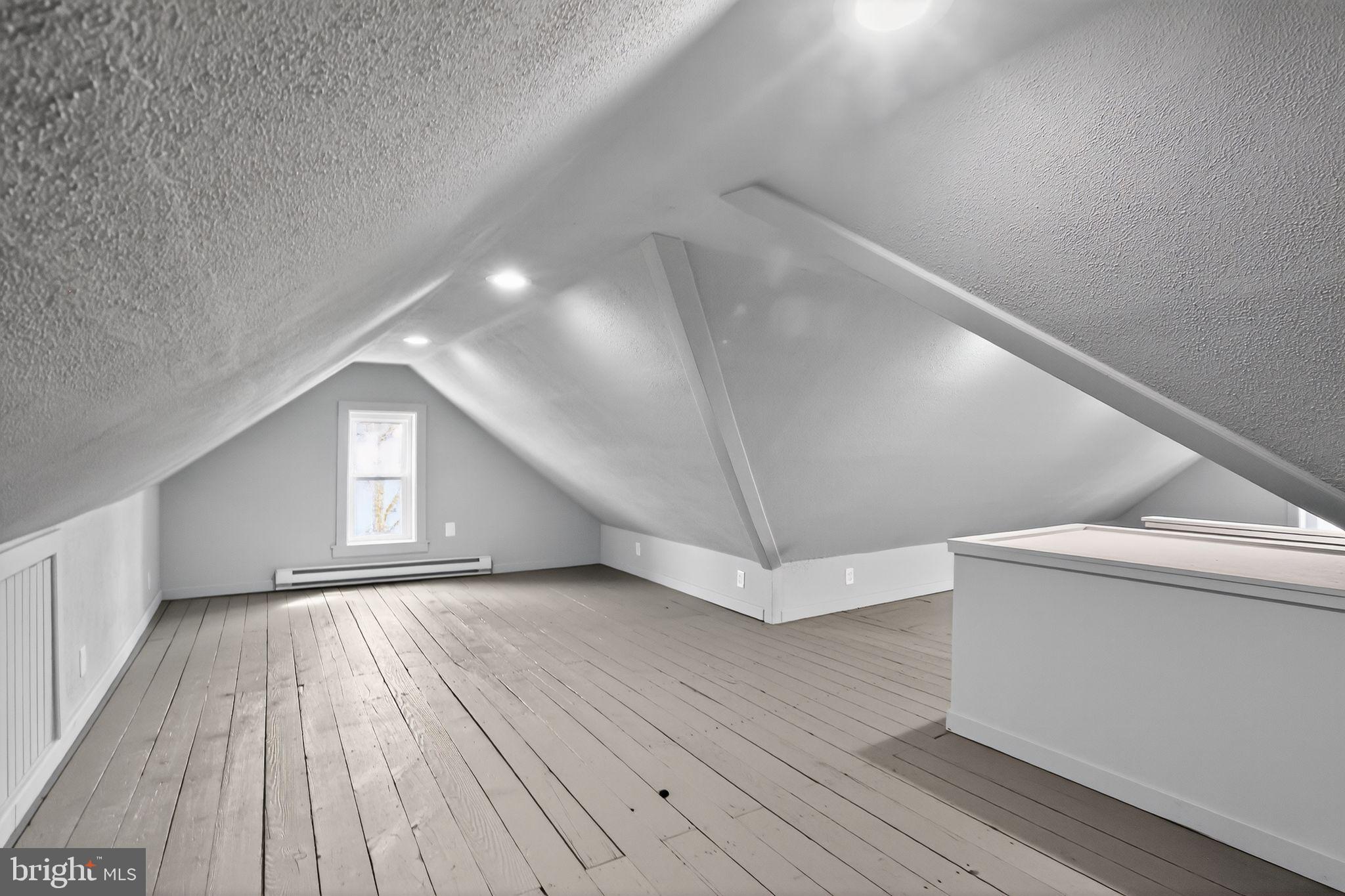 128 Maugers Mill Road Pottstown, PA 19464 - Photo 30 of 42 Spacious attic with modern charm.