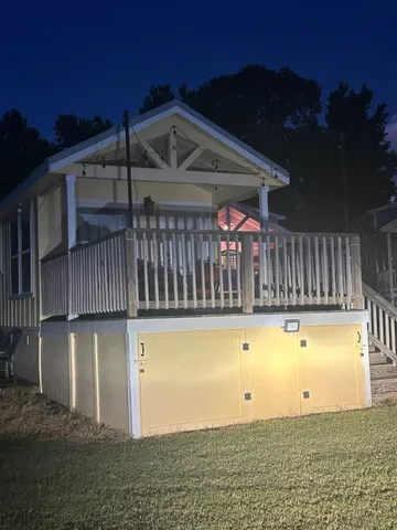 a view of a swimming pool with an outdoor seating