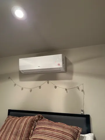 a view of a lake with a building in the background