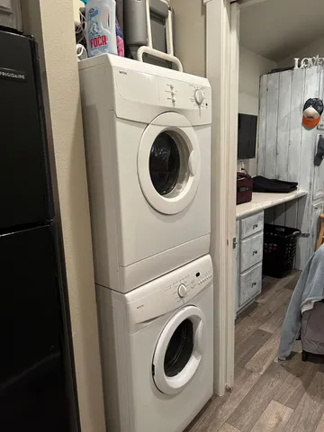 a utility room with dryer and washer
