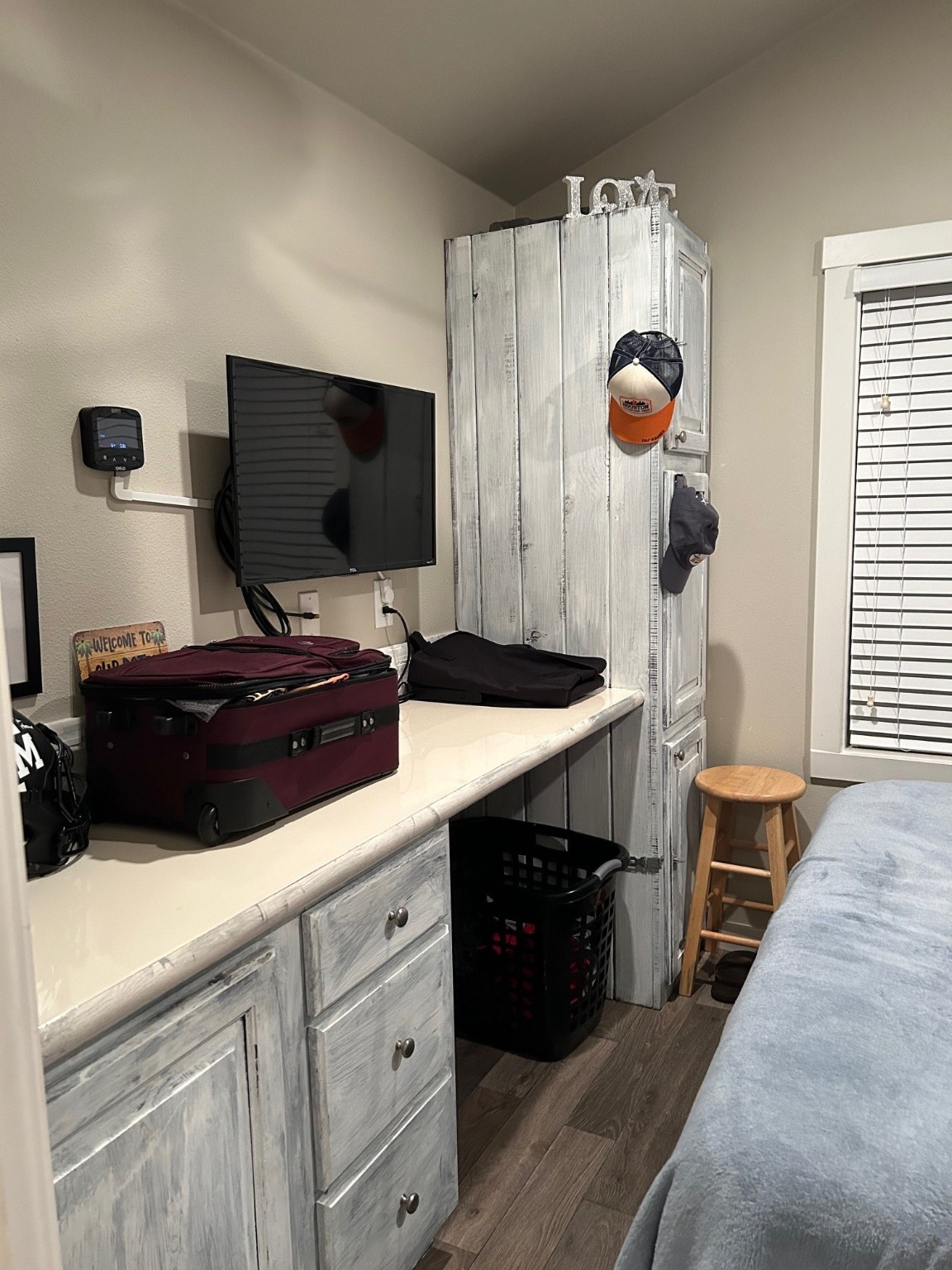 12922 Longstreet Road, Unit L10 Willis, TX 77318 - Photo 6 of 21 a kitchen with a sink and a stove top oven