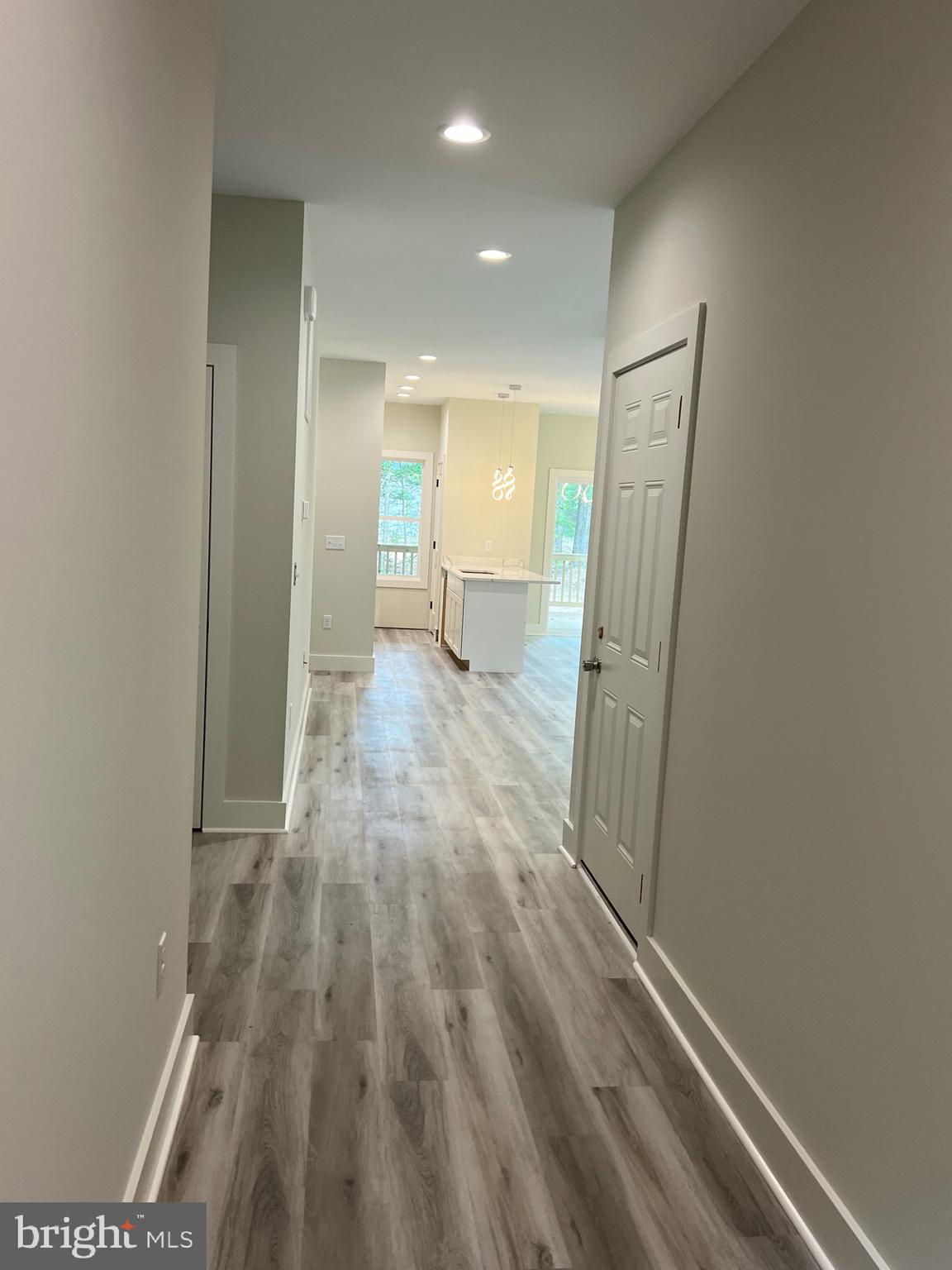 175 Rose Way Colonial Beach, VA 22443 - Photo 8 of 33 a view of a room with wooden floor and a staircase