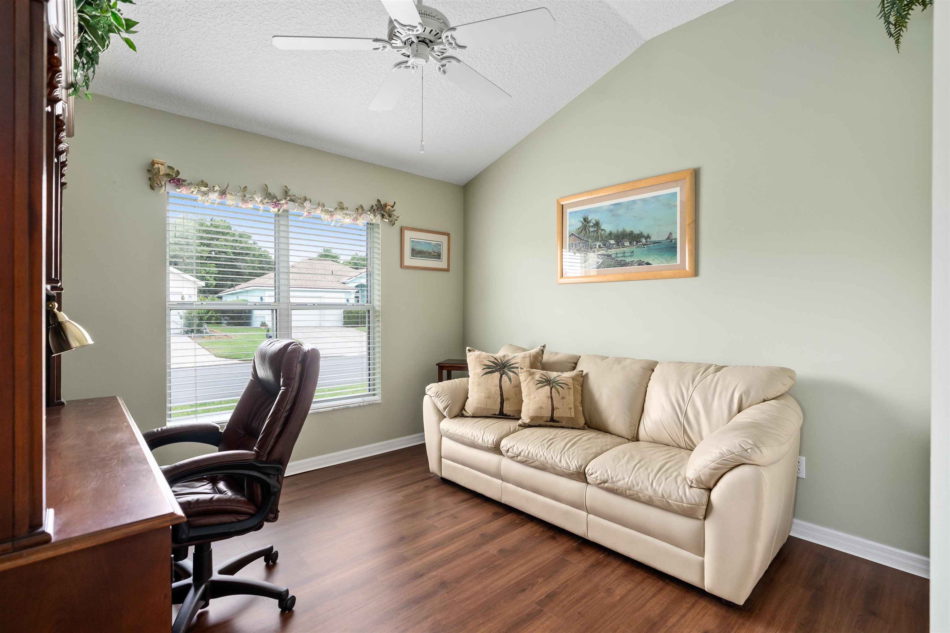 2325 Commodores Club Boulevard St. Augustine, FL 32080 - Photo 19 of 38 a living room with furniture and a large window