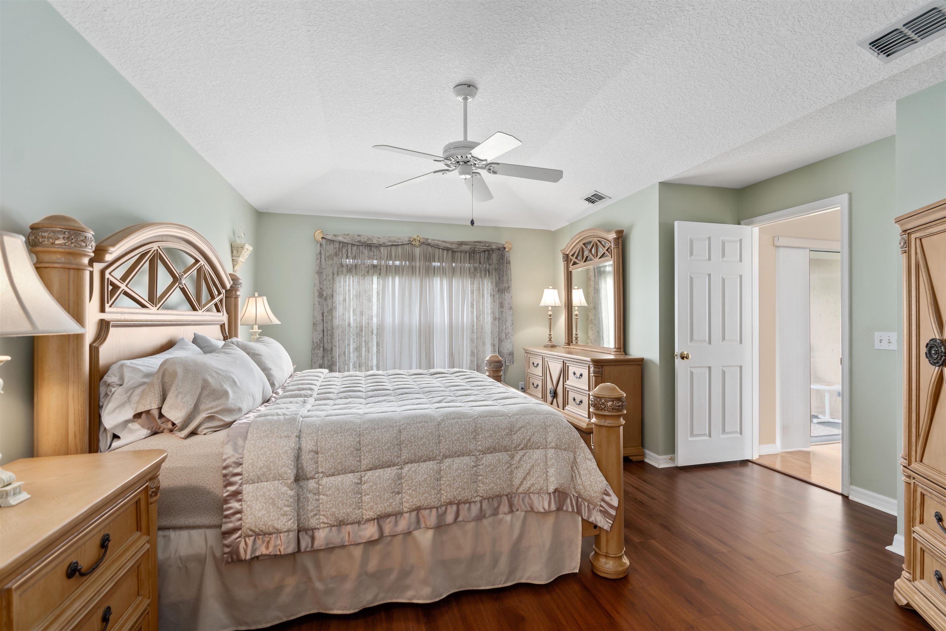 2325 Commodores Club Boulevard St. Augustine, FL 32080 - Photo 22 of 38 a bedroom with a bed and window