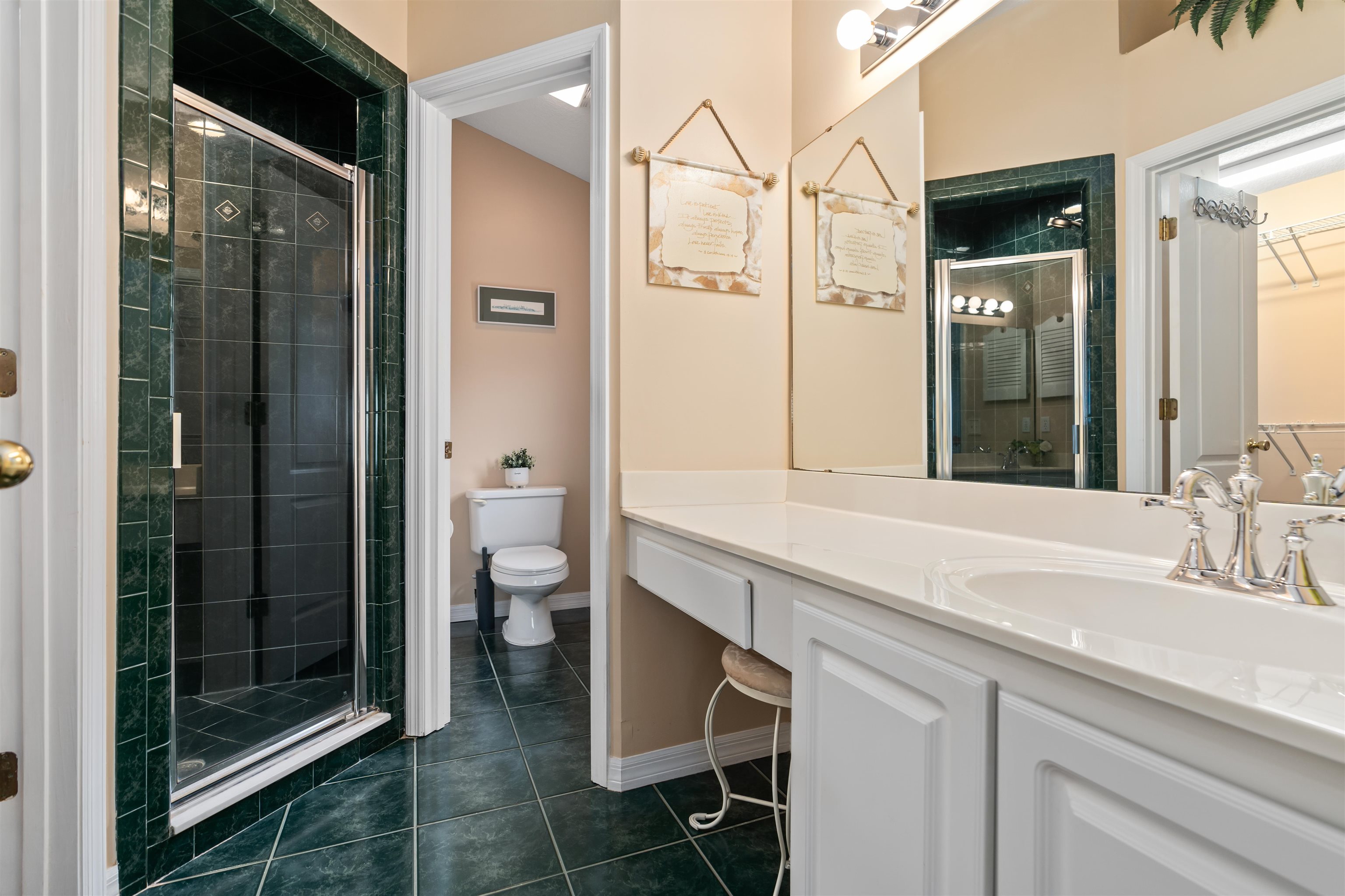 2325 Commodores Club Boulevard St. Augustine, FL 32080 - Photo 25 of 38 a bathroom with a sink a toilet and shower