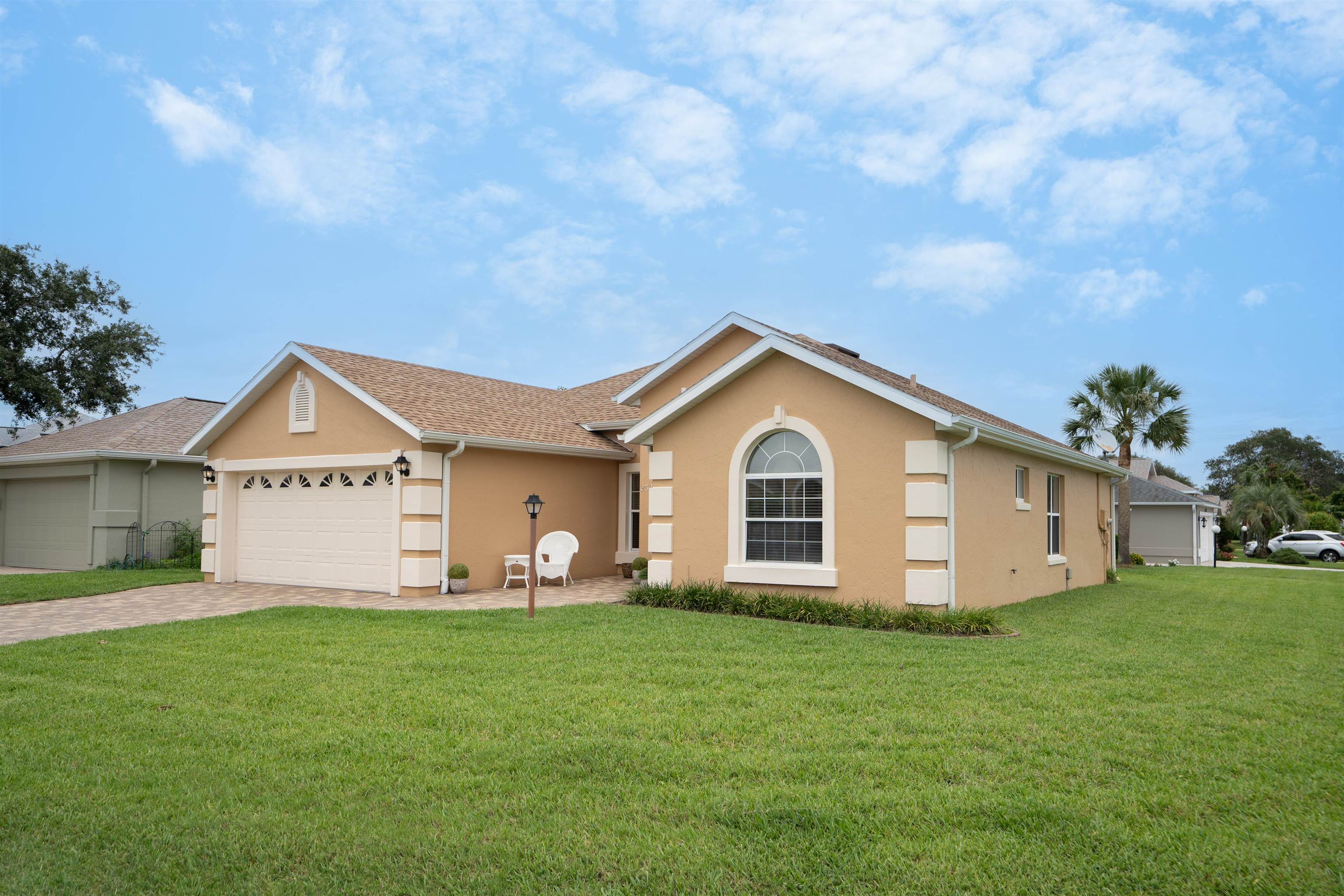 2325 Commodores Club Boulevard St. Augustine, FL 32080 - Photo 37 of 38 a view of a house with a yard and sitting area