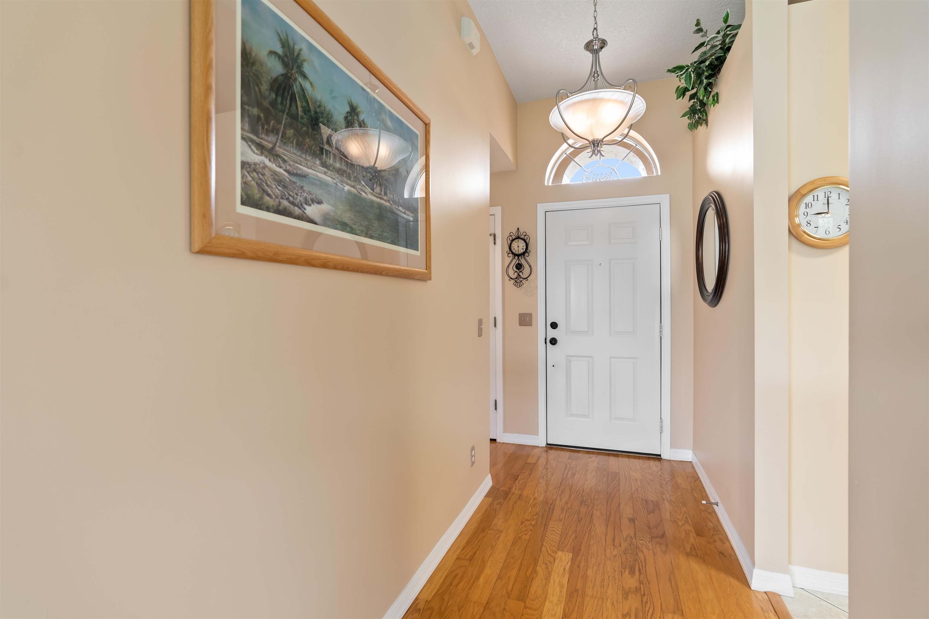 2325 Commodores Club Boulevard St. Augustine, FL 32080 - Photo 4 of 38 a view of a hallway with wooden floor