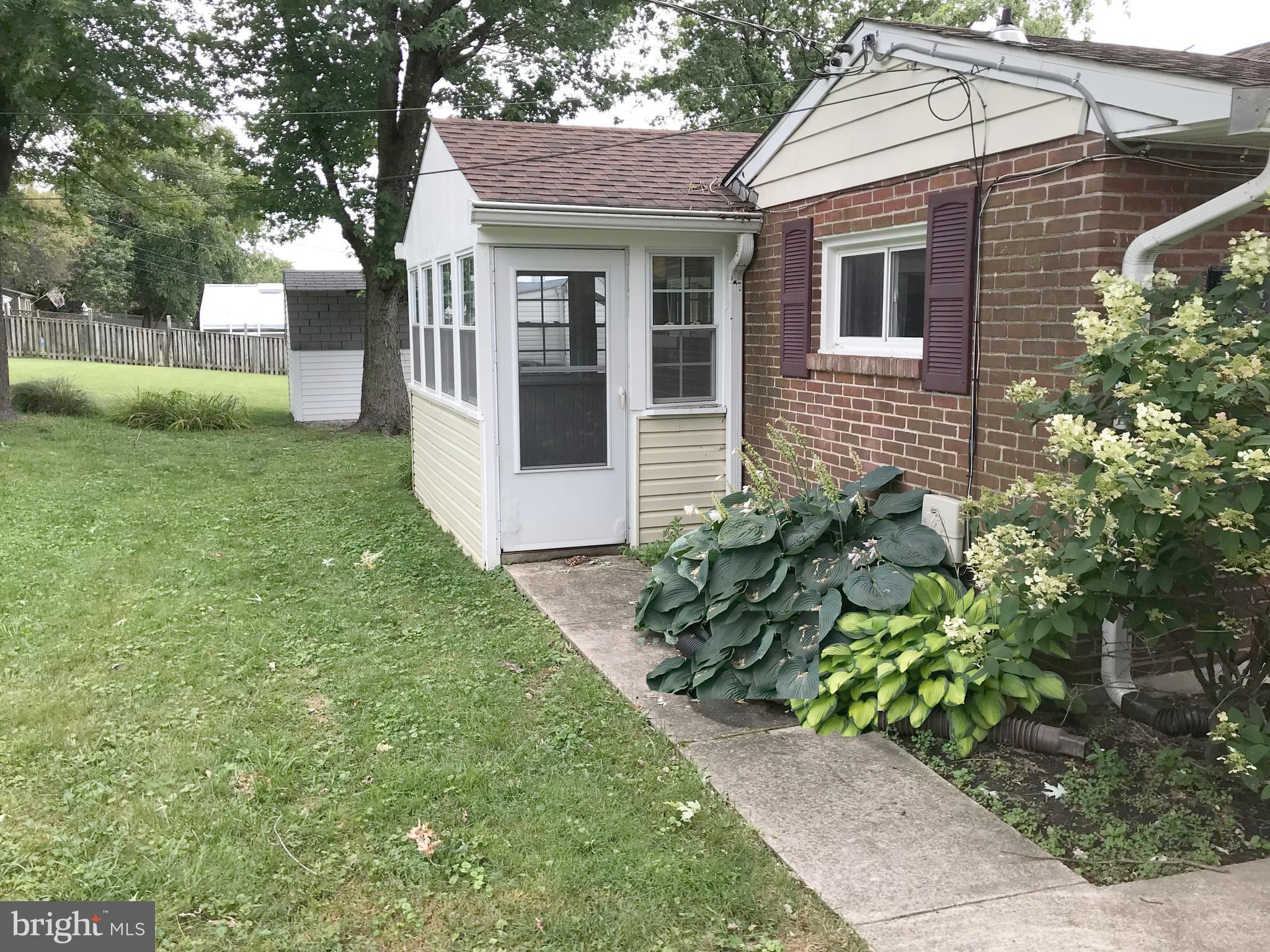 2414 Ellis Road Baltimore, MD 21234 - Photo 3 of 23 Rear entrance to enclosed porch