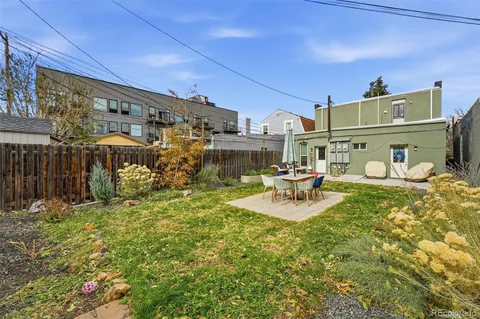 a building outdoor space with patio furniture and entertaining space