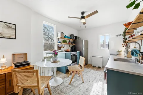 a workspace with furniture and a kitchen