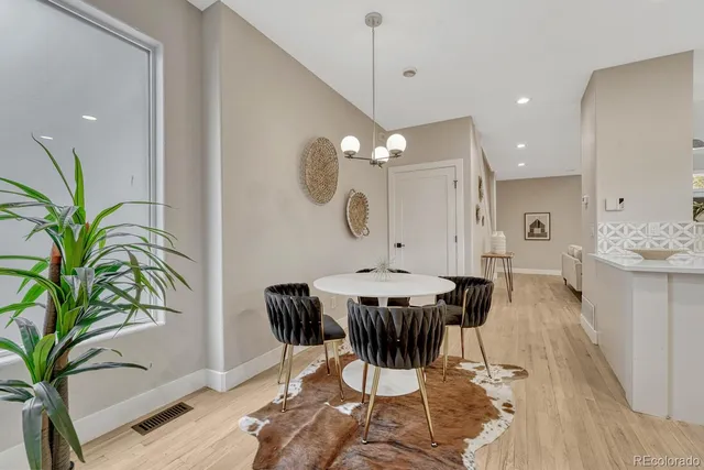 a kitchen with a sink stove and refrigerator