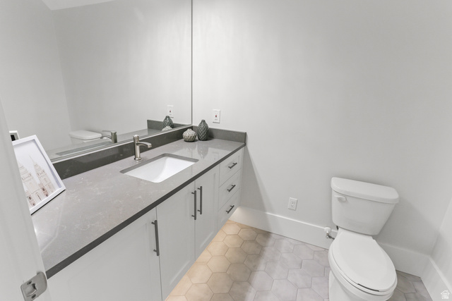 1354 South 800 East Mapleton, UT 84664 - Photo 62 of 129 Half bath with vanity and light tile patterned floors