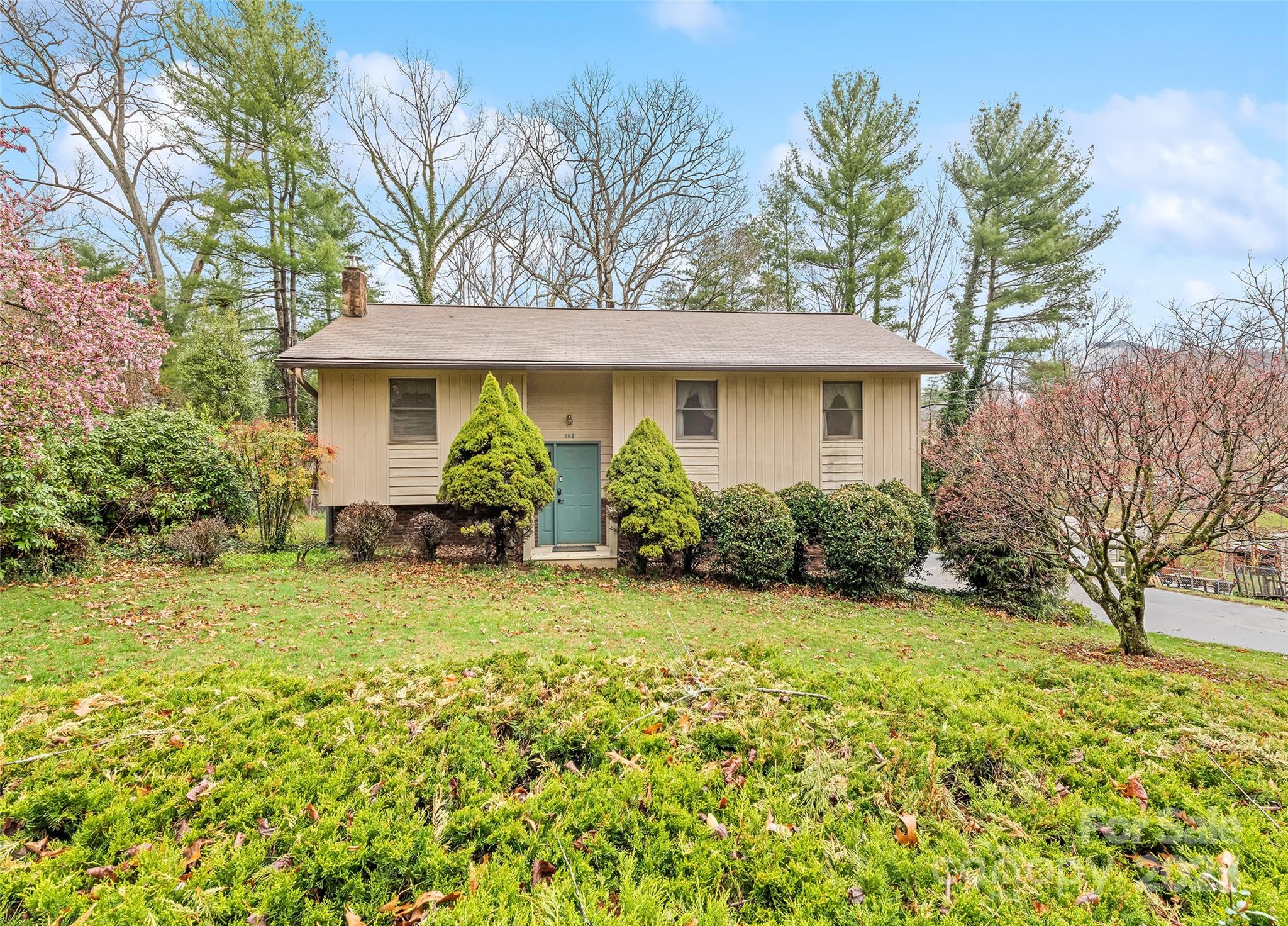 192 Poplar Drive Clyde, NC 28721 - Photo 1 of 33 a view of a house with backyard and garden