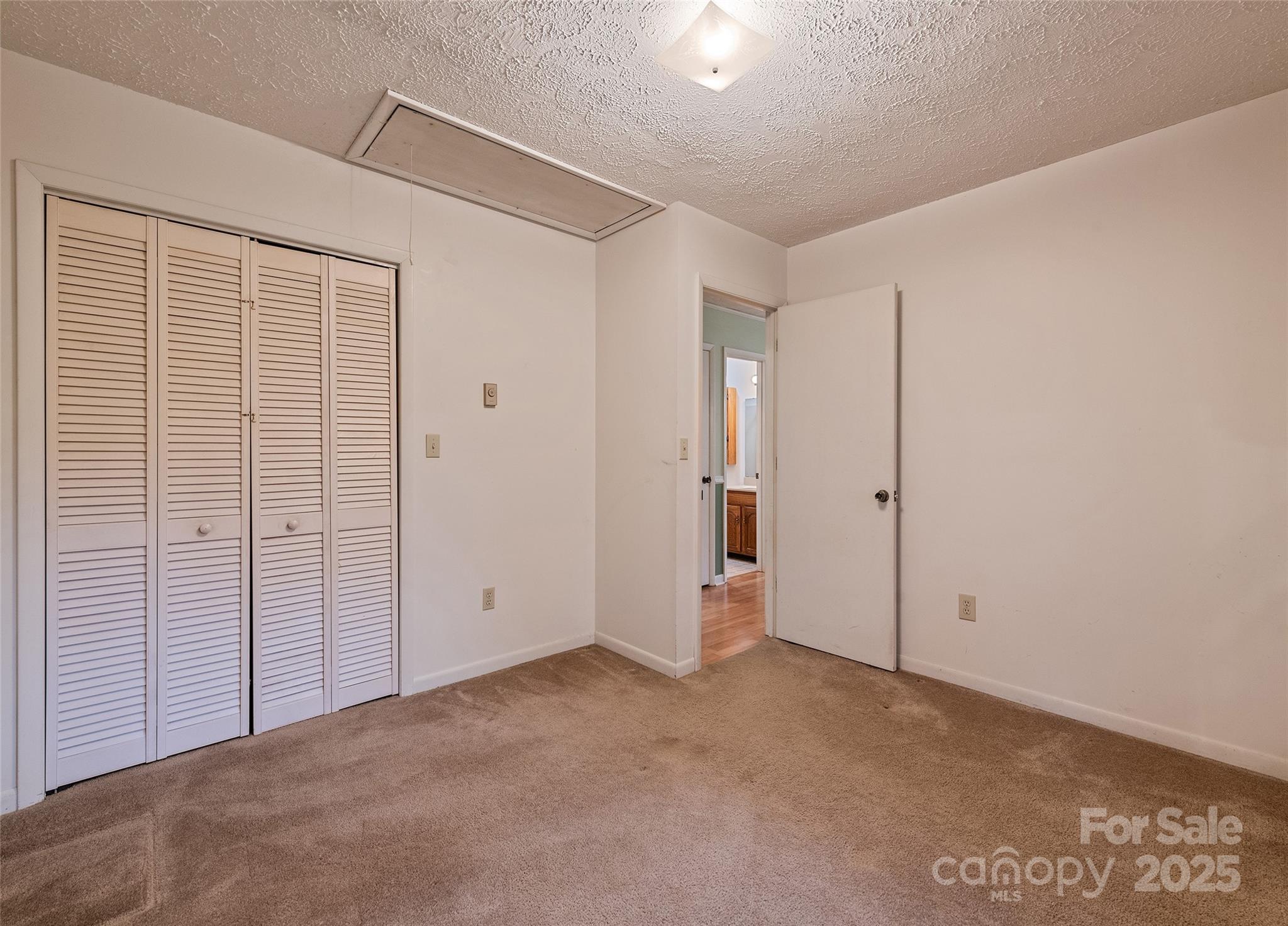 192 Poplar Drive Clyde, NC 28721 - Photo 17 of 33 an empty room with closet