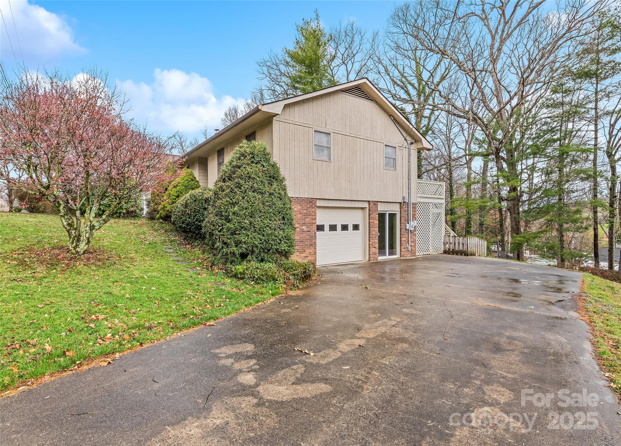 192 Poplar Drive Clyde, NC 28721 - Photo 2 of 33 a view of a house with a yard