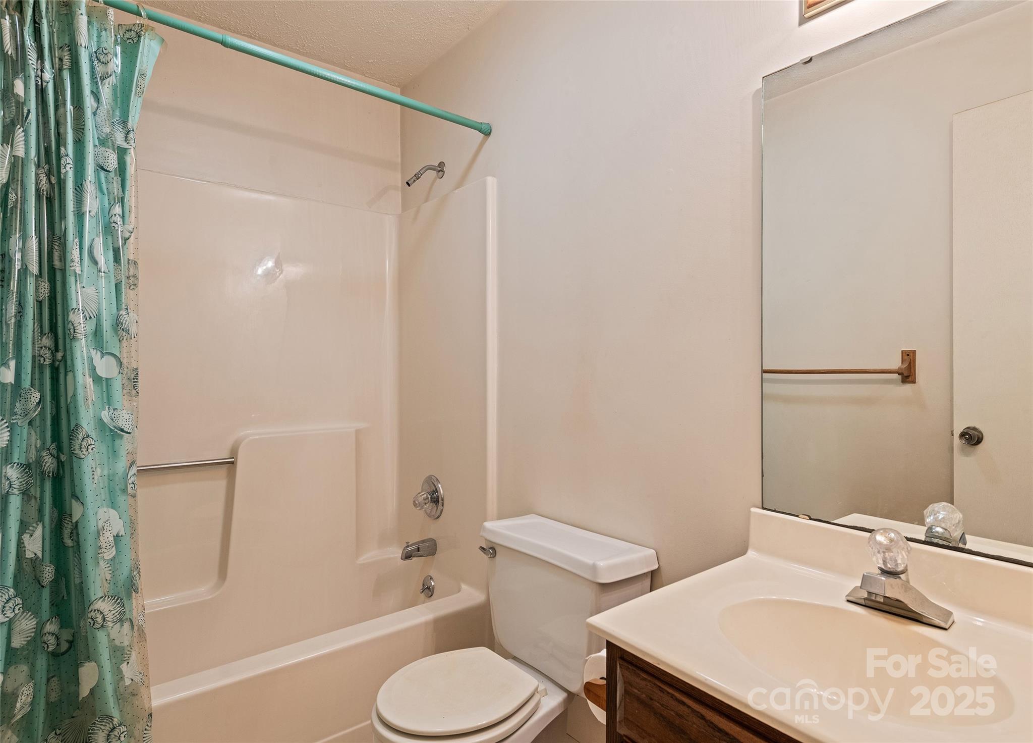 192 Poplar Drive Clyde, NC 28721 - Photo 24 of 33 a bathroom with a sink toilet and shower