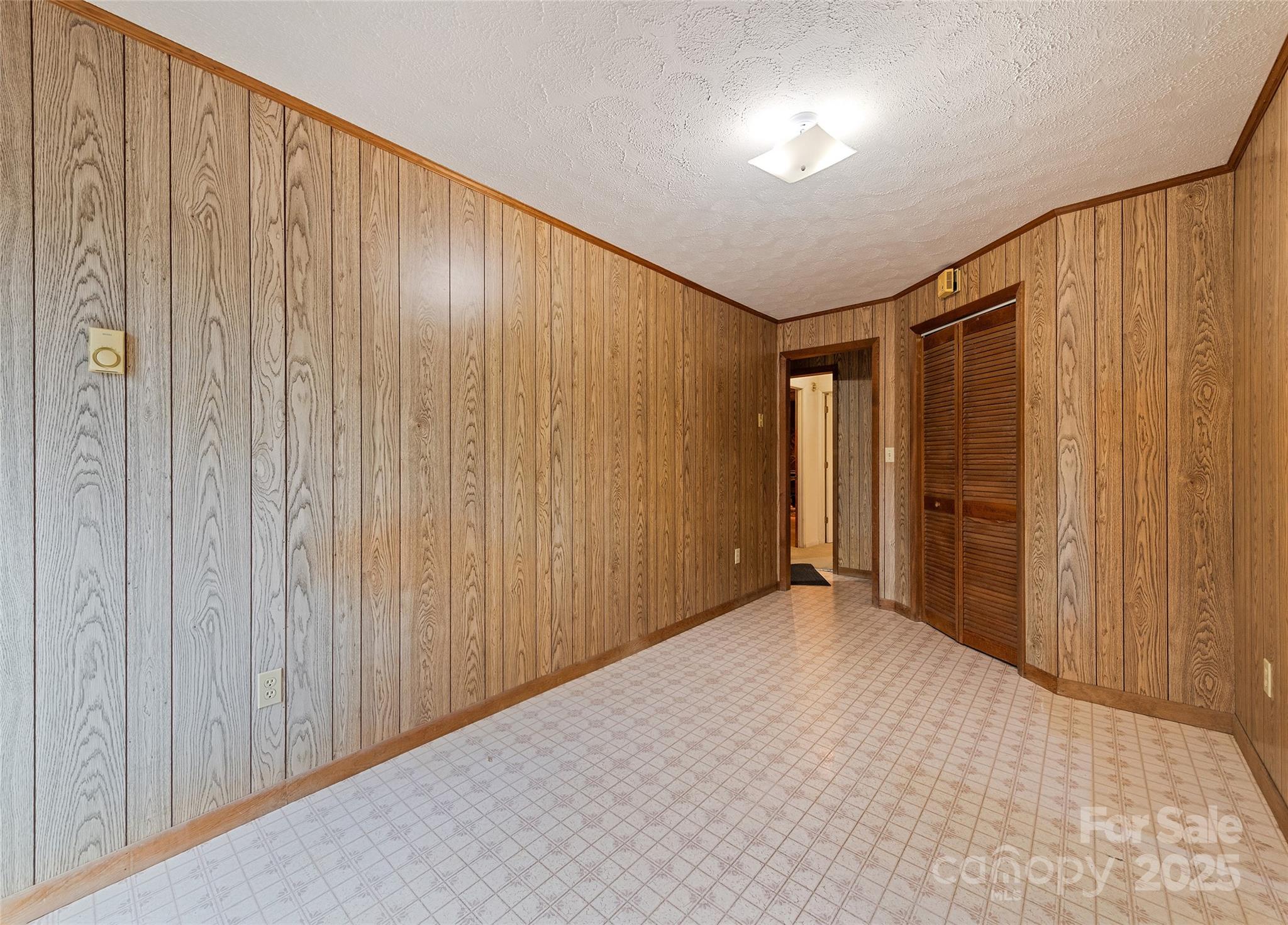192 Poplar Drive Clyde, NC 28721 - Photo 26 of 33 a view of an empty room with wooden walls