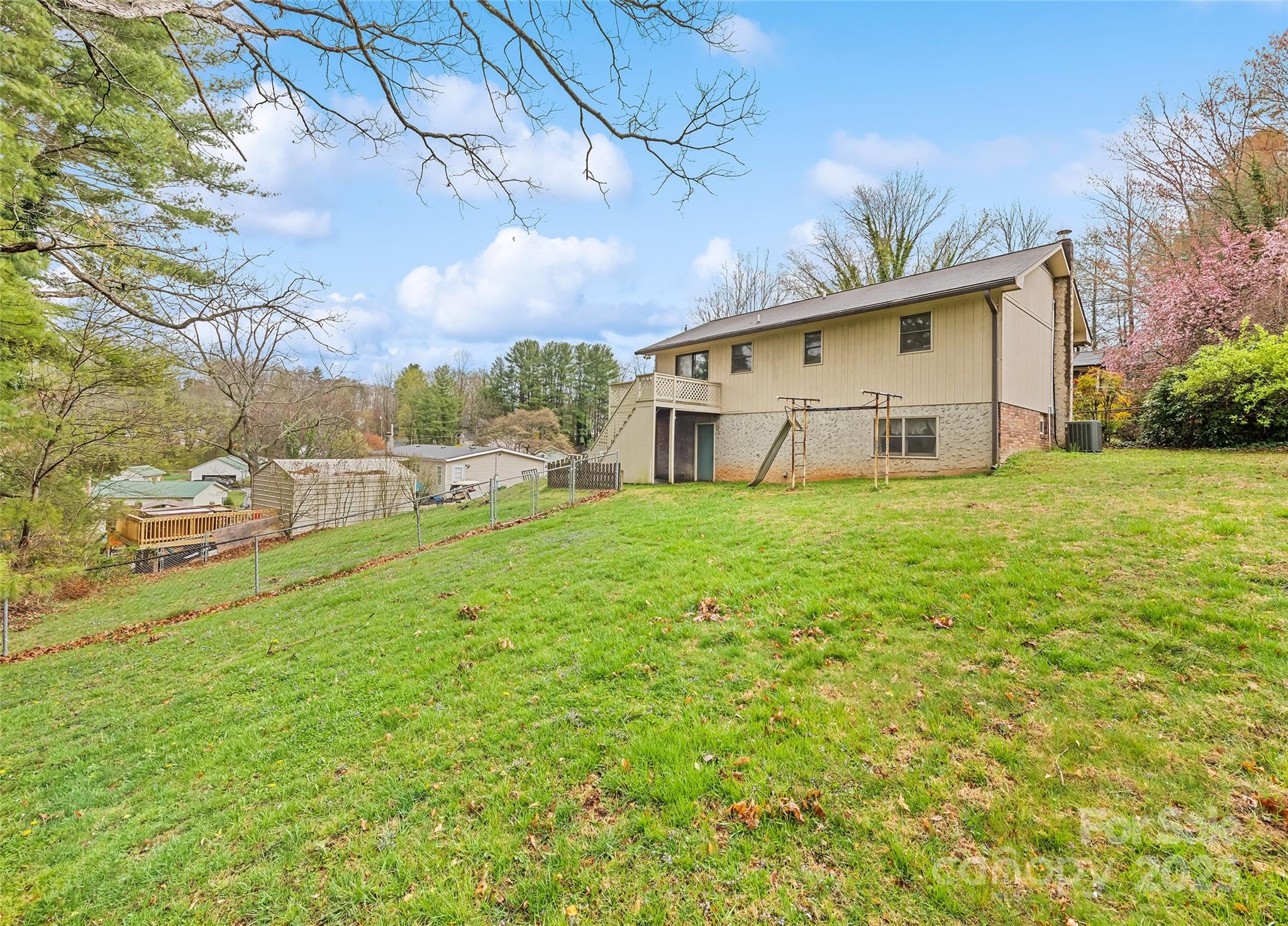 192 Poplar Drive Clyde, NC 28721 - Photo 3 of 33 a view of a house with a yard