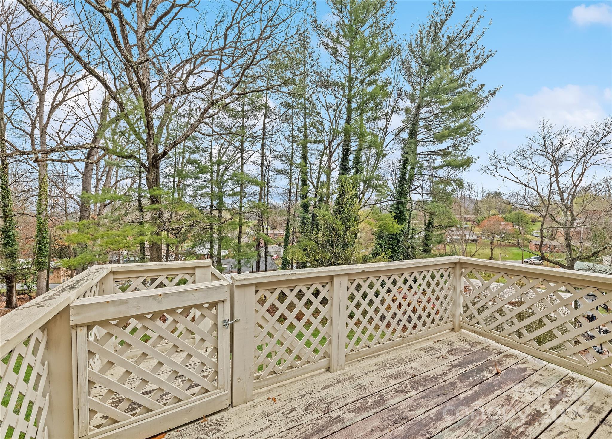 192 Poplar Drive Clyde, NC 28721 - Photo 31 of 33 a view of a wooden roof with trees