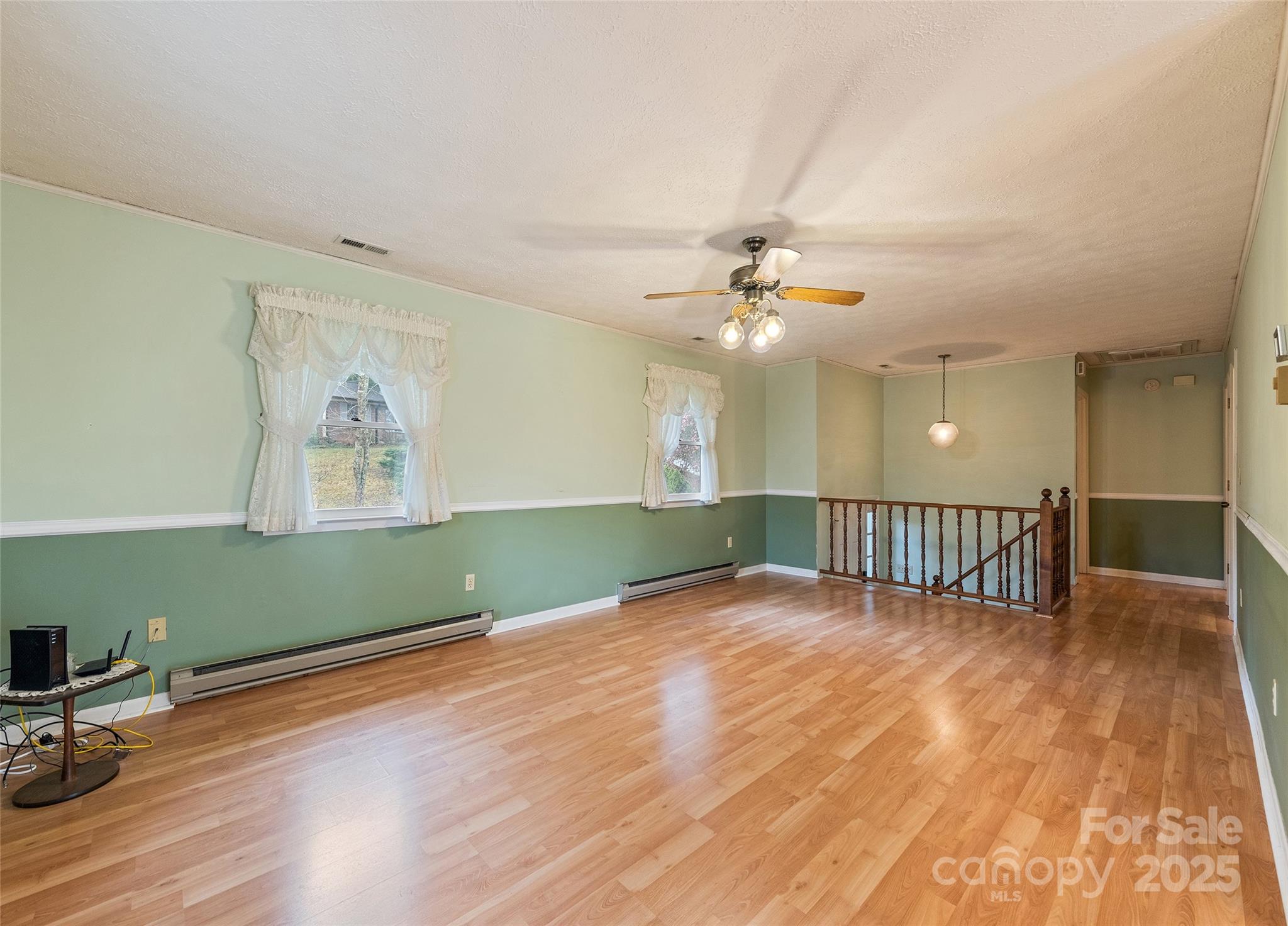 192 Poplar Drive Clyde, NC 28721 - Photo 5 of 33 a view of an empty room with a window