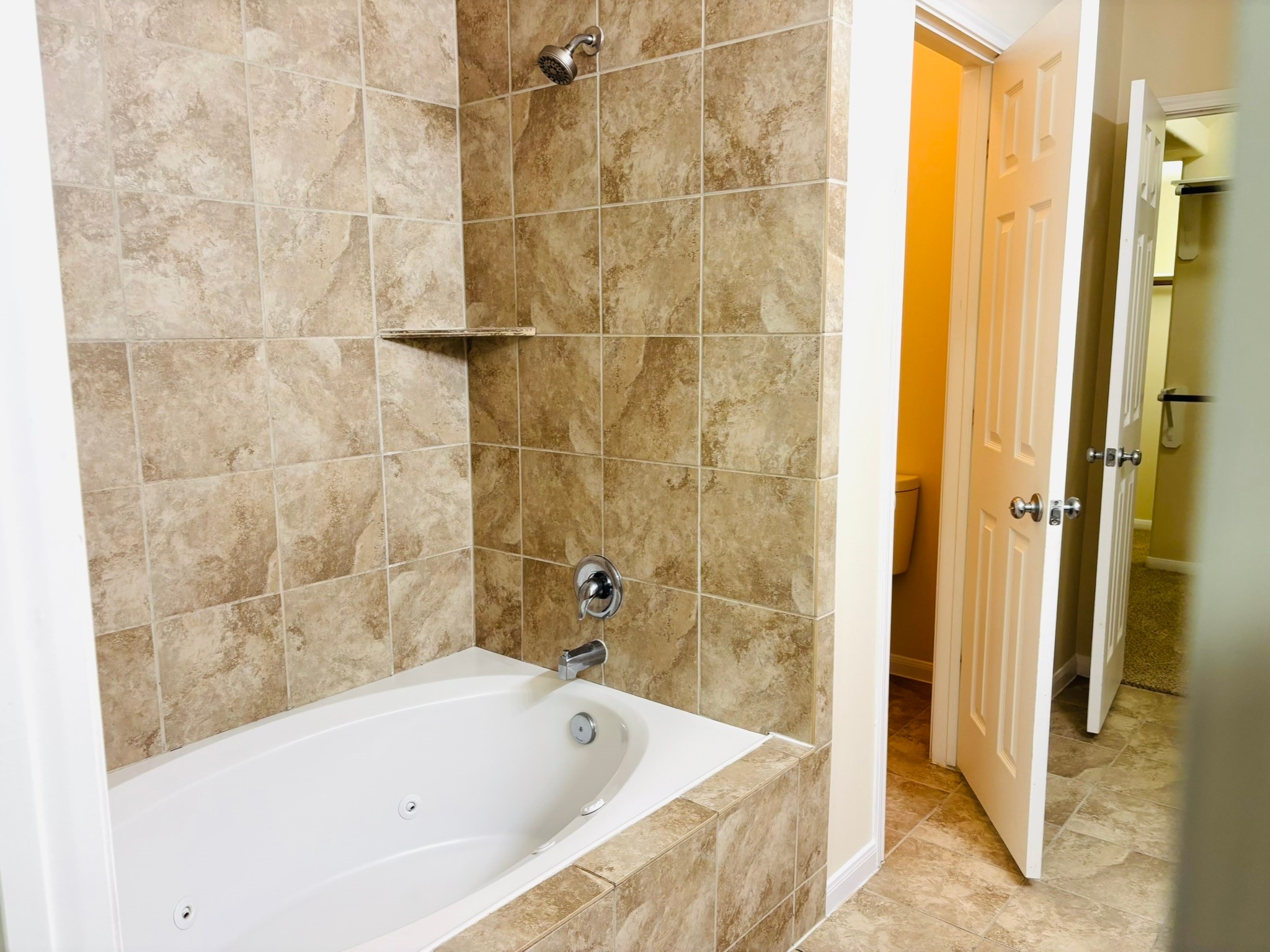 8525 Sunset Loch Drive Spring, TX 77379 - Photo 13 of 24 a bathroom with a bathtub and shower