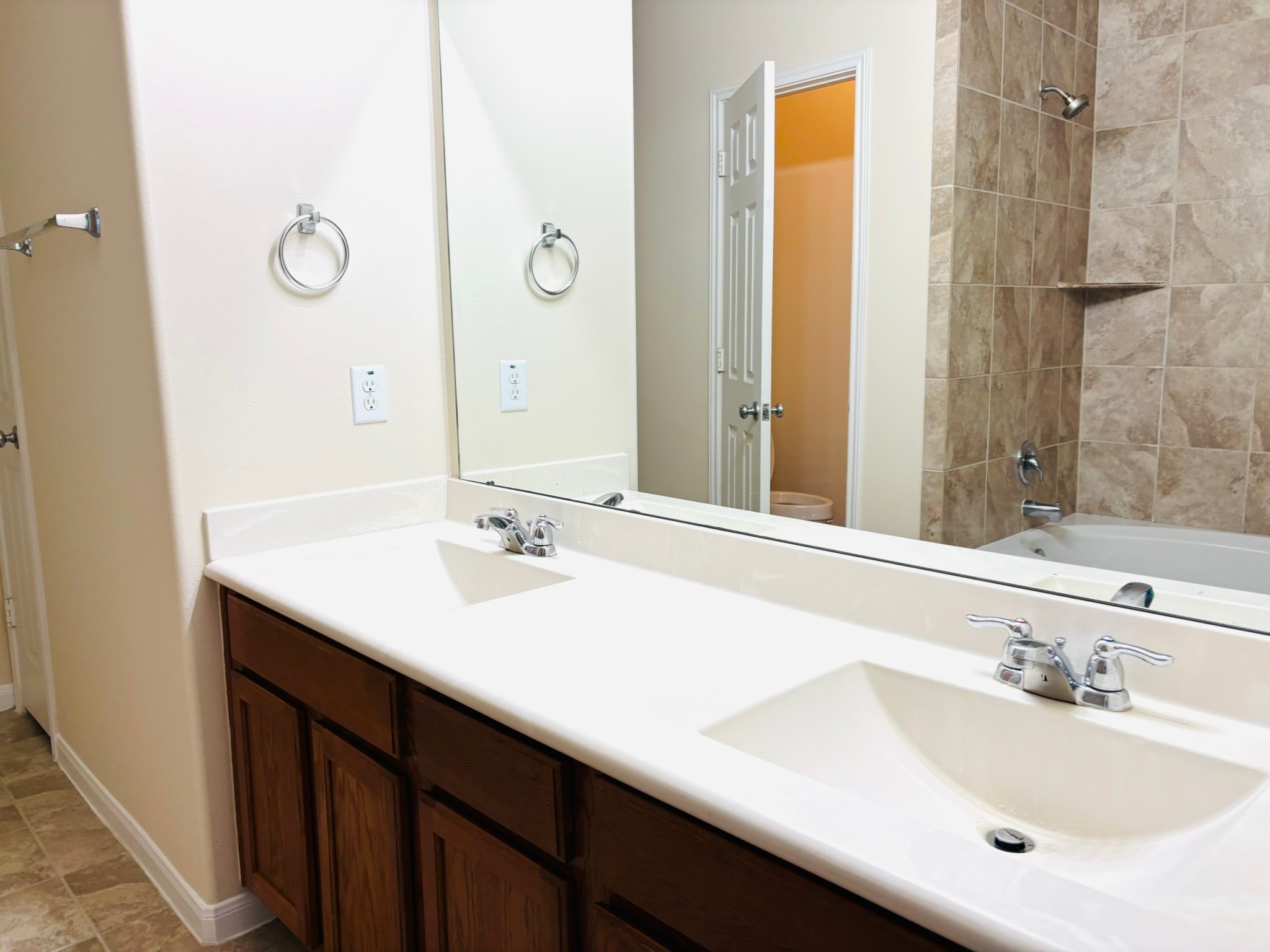 8525 Sunset Loch Drive Spring, TX 77379 - Photo 14 of 24 a bathroom with a sink and a mirror